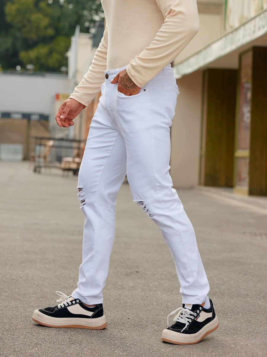 White skinny store jeans with rips